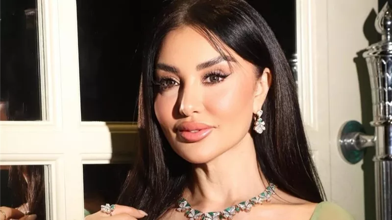 ميساء مغربي تتألق بفستان أخضر زيتوني من توقيع Alhasnaa Signature